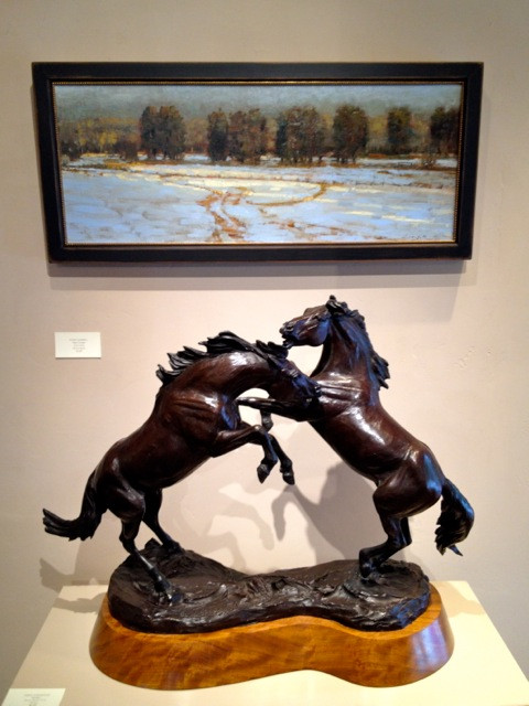 Peter Campbell's landscape above Veryl Goodnight's bronze horses.