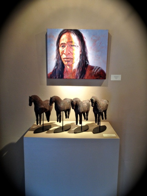 Nathan Solano's painting above Amy Laugesen's clay horse sculpture.